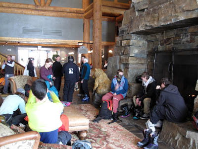 Skiers in the Moonlight Basin Lodge lobby