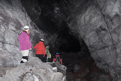 Hikers in Lava Beds NM Crystal Cave