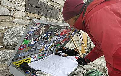 Signing the ount Whitney summit register