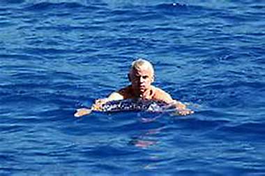 Lee Juillerat swims in Crater Lake