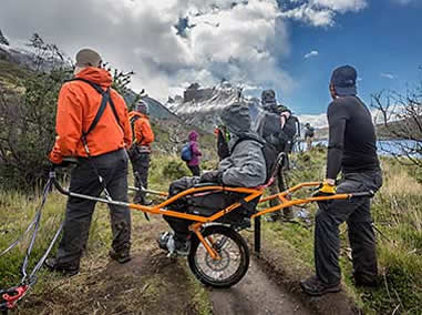Wheeled litter ride up Patagonian mountain