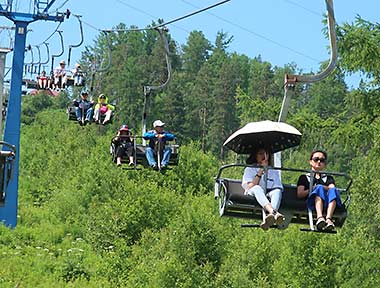 Russian summer chairlift ride to Chersky Stone near Lake Baikal