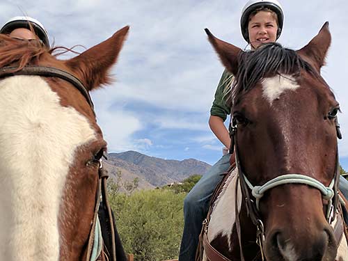 Erysse and Iden on a horseback ride in Tucson in October 2018