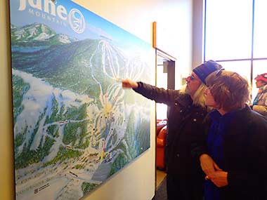 Pointing at map of June Mountain