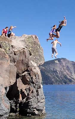 Jumping into Crater Lake, Oregon