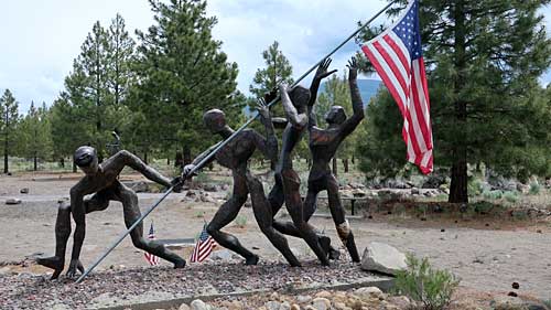 Oregon Living Memorial Sculpture Garden raising flag