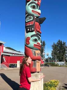 Hoonah tour guide at totem pole