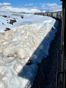 Snow alongside Skagway Railroad route