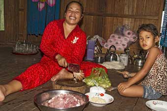 Cambodia Koh Trong Island woman prepares dinner