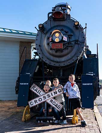 Grand Canyon Railway kids posing with engine