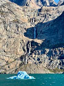 Greenland Prins Christian Sund Waterfalls and iceberg