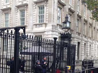 Number 10 Downing Street lies behind well-guarded gates.