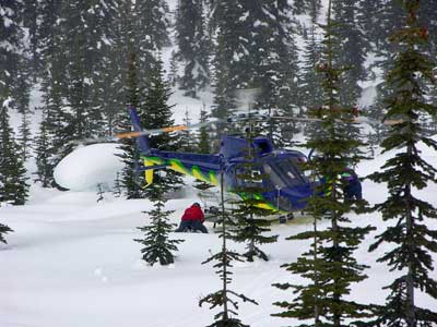 Unloading skis from heli