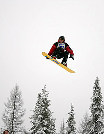 Leaping snowboarder