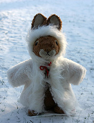 First snow for Truffles the rabbit doll
