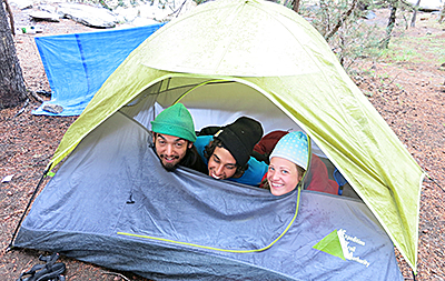 Three friends in a tent on the John Muir Trail