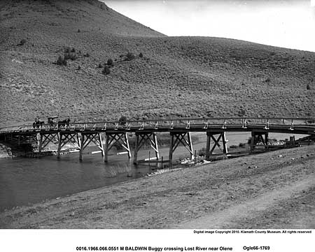 A buggy crosses the old bridge over the Lost River near Olene, Oregon