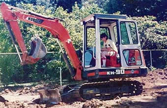 Landscaping with backhoe
