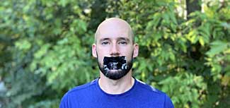 Anthony Lorubbio with his mouth taped shut
