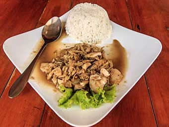 Mekong snakefish cooked with ginger and served with rice, a popular Cambodian dish.