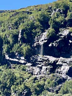 The Flåmsbana offers views of waterfalls along the route.