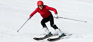 Downhill skier in Pole, Pedal, Paddle race