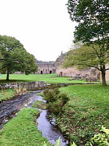 Fountains Abbey on the banks of the River Skell