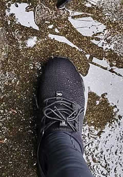KURU shoe in puddle