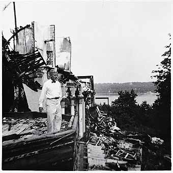 Hugh F. McKean at Tiffany's Laurelton Hall surveying fire damage