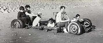 Car chasis on beach
